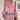 Bohemian-style floral blouse with a pink paisley pattern, featuring a tassel tie-neck and long sleeves.