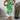 Floral print sleeveless summer tunic top for women featuring a vibrant green background with colorful floral patterns, designed with a relaxed fit and a round neck.
