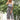 Women's floral strappy jumpsuit with a bohemian summer style, featuring a sleeveless design and flowing fit, perfect for warm weather.