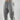 Gray men's tapered joggers made of lightweight fabric designed for athletic activities, featuring a comfortable fit around the waist and legs.