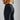 Gray men's tapered joggers, lightweight athletic sweatpants, displayed on a model highlighting the fit around the waist, knees, and thighs.