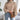 Green women's chunky cable knit high-neck wool sweater with long sleeves and a textured design.