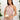 Ivory backless bridesmaid maxi dress with crossover straps and pockets, worn by a smiling woman.