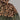 Leopard Print Faux Fur Hoodie featuring a cozy two-tone design with a brown and beige pattern, showcasing woolen textile material ideal for women's winter wear.