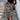 Leopard Print High-Waist Midi Skirt worn by a model standing with hands on hips, showcasing the trendy women's fashion piece.