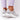 Lightweight beige women's low-top fashion sneakers displayed on a model's feet, showcasing their chic and breathable design.