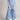 Women's pink linen loungewear set featuring a tunic with sleeves and matching pants, suitable for summer maternity wear.