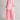 Women's pink linen loungewear set featuring a tunic top and pants designed for summer maternity wear, showcasing short sleeves and a comfortable waistline.