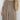 Elegant two-tone women's luxury designer tote bag, featuring a beige and white color scheme, worn over the shoulder.