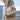 Luxurious women's winter coat made from multi-tone faux fur, featuring a stylish design with beige hues and long sleeves.
