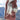 Luxury multi-tone faux fur jacket for women, featuring a designer winter coat style. The jacket has a soft white hue, full sleeves, and covers the shoulders and neck, ideal for cold weather.