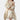 Luxury women's fleece robe in a soft cream color, featuring a cozy wrap design with a tie-front closure. The robe has long sleeves and a comfortable fit, covering the shoulders and extending to the legs, resembling a one-piece garment.