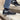 Men's black lightweight sneakers worn with jeans, showcasing breathable and non-slip features, suitable for everyday fashion and walking.