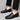 Men's blue leather loafers with metal buckle, slip-on dress shoes being worn, showcasing a sleek and stylish design suitable for formal occasions.