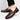 Men's blue leather loafers with a slip-on design featuring a metal buckle, styled as dress shoes.