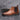 Men's brown leather Chelsea boots featuring a durable slip-on design, ideal for ankle wear. The boots are crafted from high-quality leather, showcasing a rich brown hue and stylish fashion accessory suitable for both casual and work settings.