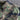 Men's durable military camo style jacket featuring a grey camouflage pattern, long sleeves, and a sturdy collar, designed for tactical outerwear use.