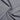 Men's long sleeve gray chambray shirt made of breathable cotton fabric, displayed on a wooden background.