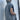 Men's grey lightweight quilted sleeveless zip-up puffer vest with a high collar.