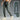Men wearing lightweight jogger pants with zipper pockets, featuring an adjustable waist, standing in a neutral pose.