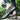 Men's navy waterproof slip-on walking shoes displayed on a person's feet, paired with jeans, showcasing their lightweight and anti-slip design in a natural outdoor setting.