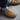 Men's orthopedic tan leather slip-on clogs for casual and work wear, shown on a person's feet.