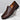 Men's premium blue leather penny loafers shown in a luxury slip-on design, featuring a smooth leather finish and a sturdy synthetic rubber sole, displayed on a model's feet.