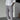Men's slim fit gray pinstripe trousers, shown in a lightweight fabric suitable for summer fashion; the trousers are styled with a partial view of a dress shirt and dress shoes.