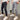 Men's slim fit black cargo pants, tapered style, showcasing versatility and fashion-forward design.