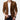 Men's slim fit brown corduroy blazer worn over a black dress shirt and paired with jeans, showcasing a casual business fashion look. The model is wearing a watch on their wrist, emphasizing a stylish and fashionable appearance.