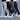 Men's slim-fit fleece joggers with cuffed ankles in a multipack, demonstrating the fit on a model's legs, waist, and knees, emphasizing the overall sleek and modern appearance of the trousers.