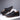 Men's tan leather slip-on loafers with a comfortable and lightweight design, featuring a sleek fashion-forward look suitable for walking.