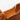 Men's tan leather slip-on loafers featuring a comfortable and lightweight design in a shade of brown.