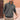 Men's dark gray ribbed half-zip sweater worn by a bearded man, highlighting the casual and lightweight knitwear design. The sweater is styled with a dress shirt underneath, showing a fashionable layered look.