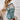 Mint green Fair Isle patterned women's sweater with a cozy Scandinavian design, featuring long sleeves, a round neckline, and intricate knit detailing.