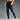 Navy blue men's lightweight joggers designed for athletic wear, showcasing moisture-wicking fabric. The pants feature a comfortable elastic waist and tapered legs, highlighting a modern fashion design suitable for sports and casual settings.
