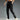 Navy blue men's lightweight joggers being worn by a model, showcasing the athletic fit and moisture-wicking fabric. The pants feature an elastic waistband and are ideal for sports or casual wear.