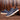 Navy blue men's low-top leather sneakers with sleek design, suitable for walking and sportswear.