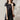Navy striped short sleeve midi dress with a belted waist, worn by a woman.