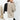 Neutral tone color-block sweater for women, featuring a trendy fall knitwear design with distinct sections of color, long sleeves, and a comfortable fit around the shoulders and neck.