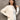 Neutral tone color-block sweater featuring long sleeves and a relaxed fit. The sweater showcases a modern design with a high neckline and color-block pattern, ideal for women's fall fashion.