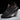 Olive green men's lightweight breathable sneakers with a cushioned sole, featuring a black and orange color scheme in size 48, designed for outdoor activities and walking.