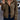 Olive green women's corduroy bomber jacket with a wide collar and long sleeves, designed for a casual chic fall style.