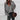 Oversized dark gray V-neck sweater with chunky knit design for women, featuring long sleeves and a relaxed fit in size XXL.