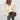 Oversized gray V-neck sweater featuring chunky knit design with long sleeves, suitable for casual wear; shown in a beige color variant, size XXL.