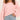 Oversized pink striped knit sweater with a cozy boat neck design, shown in 2XL size.