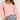 Oversized green striped knit sweater with a cozy boat neck design, featuring long sleeves and a relaxed fit.