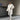 Oversized grey faux fur coat with a cozy chic winter design, featuring a broad collar and long sleeves, styled to provide warmth and a fashionable look.