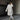 Oversized grey faux fur coat featuring a stylish trench coat design with a wide collar and long sleeves, reaching down to the knees for a cozy and chic winter fashion look.
