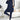 Oversized grey hoodie and leggings set in marine blue, styled for trendy urban streetwear with a focus on comfort and fashion.